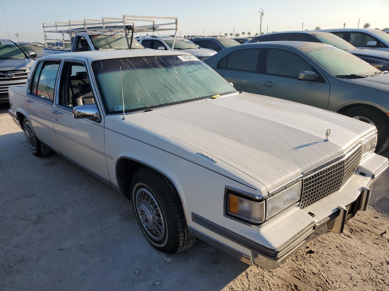 1988 Cadillac De Ville VIN 1G6CD5157J4214845 Copart auction photo, water/flood damage thumbnail 4