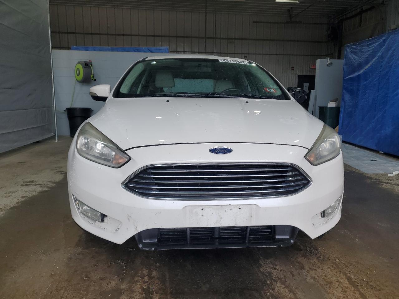 2016 Ford Focus VIN 1FADP3N25GL307087 Copart auction photo, front end / side damage thumbnail 5