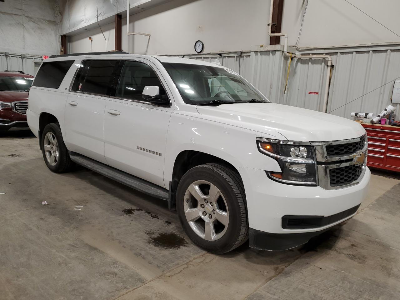 2016 Chevrolet Suburban VIN 1GNSKHKC4GR102858 Copart auction photo, normal wear damage thumbnail 4