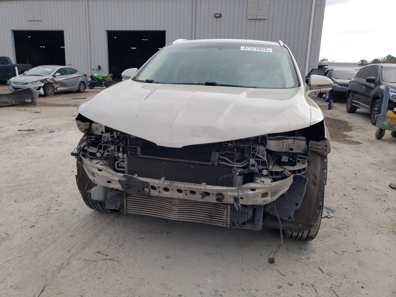 2015 Lincoln MKZ VIN 5LMCJ1A96FUJ47141 Copart auction photo, front end / minor dent/scratches damage thumbnail 5