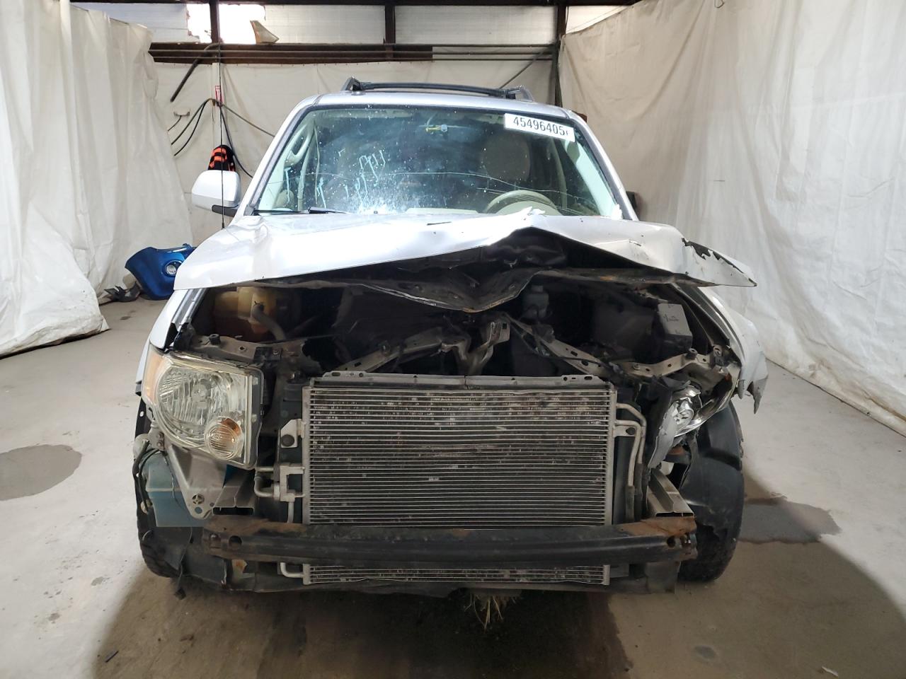 2010 Ford Escape VIN 1FMCU9EG1AKD31456 Copart auction photo, side / front end damage thumbnail 5