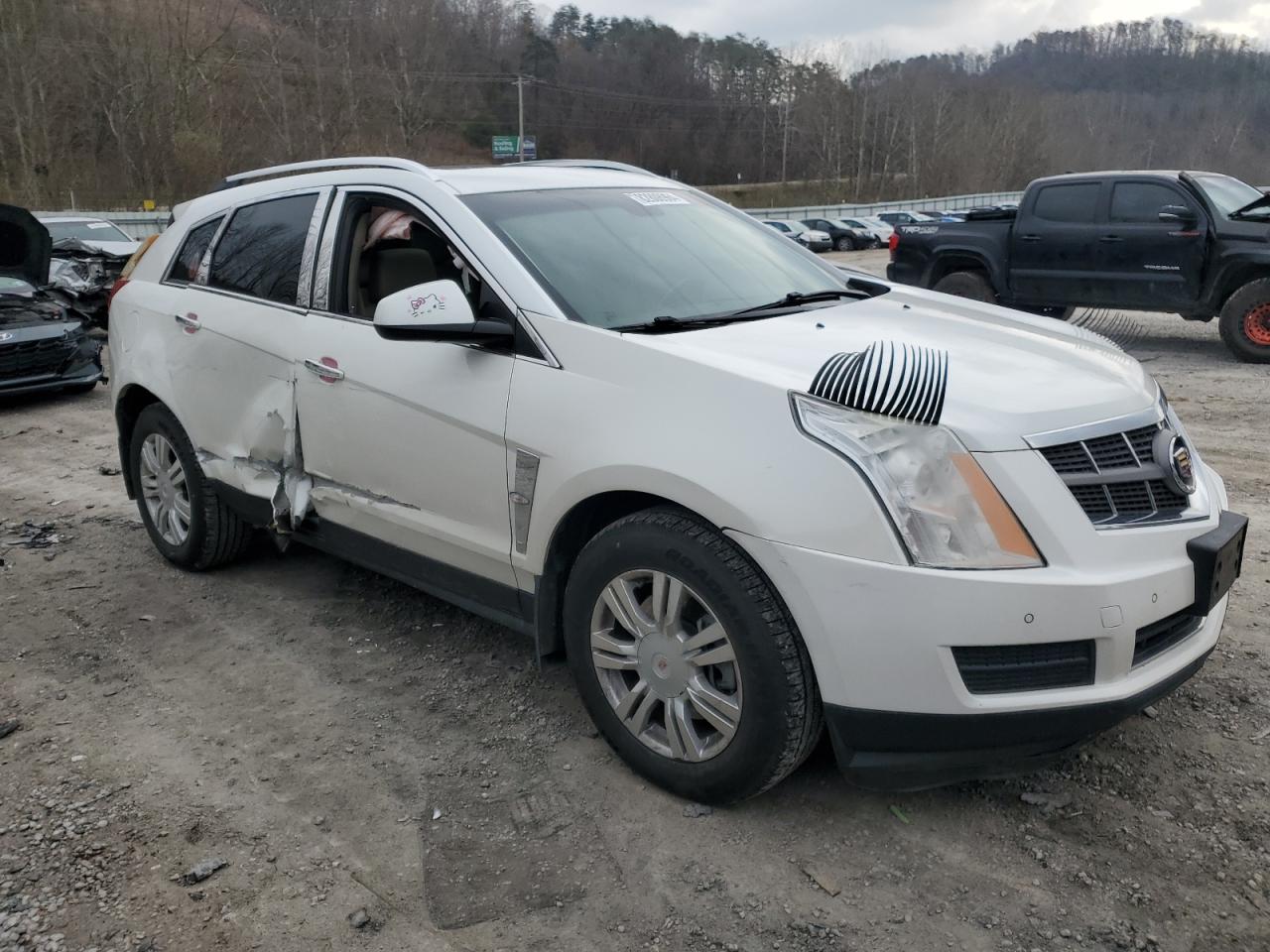 2012 Cadillac SRX VIN 3GYFNDE36CS602690 Copart auction photo, all over damage thumbnail 4