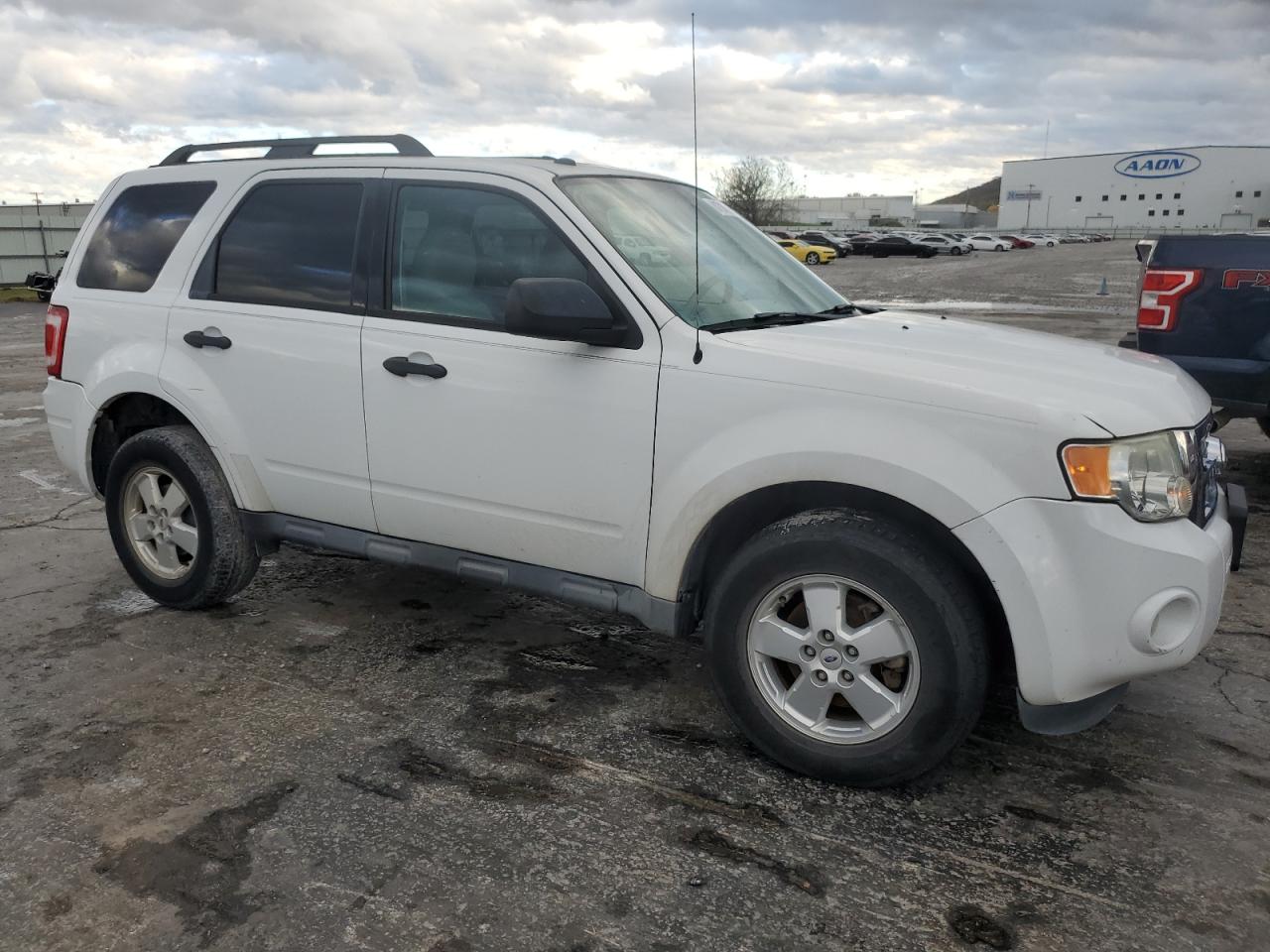 2012 Ford Escape VIN 1FMCU0DG0CKC27704 Copart auction photo, side / minor dent/scratches damage thumbnail 4