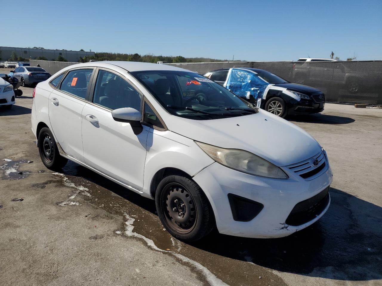 2013 Ford Fiesta VIN 3FADP4AJ5DM183867 Copart auction photo, side / front end damage thumbnail 4