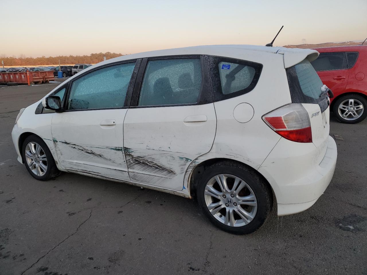 2011 Honda Fit VIN JHMGE8H56BS000038 Copart auction photo, side damage thumbnail 2