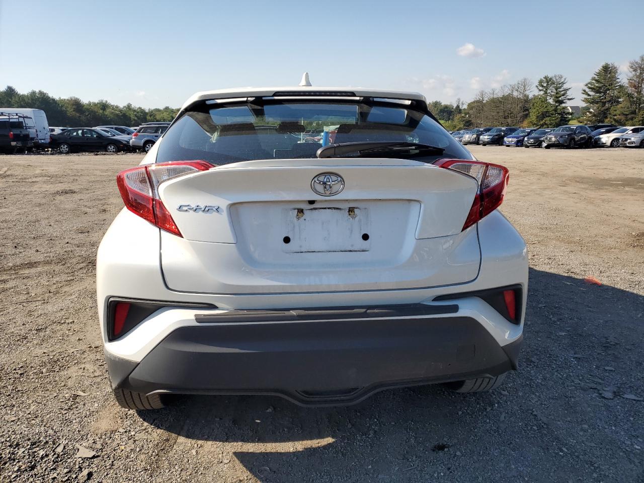 2021 Toyota C-HR VIN NMTKHMBX1MR129062 Copart auction photo, front end / minor dent/scratches damage thumbnail 6