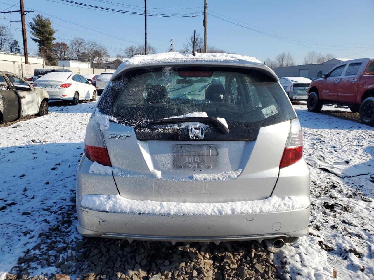 2012 Honda Fit VIN JHMGE8H57CC018379 Copart auction photo, side / front end damage thumbnail 6