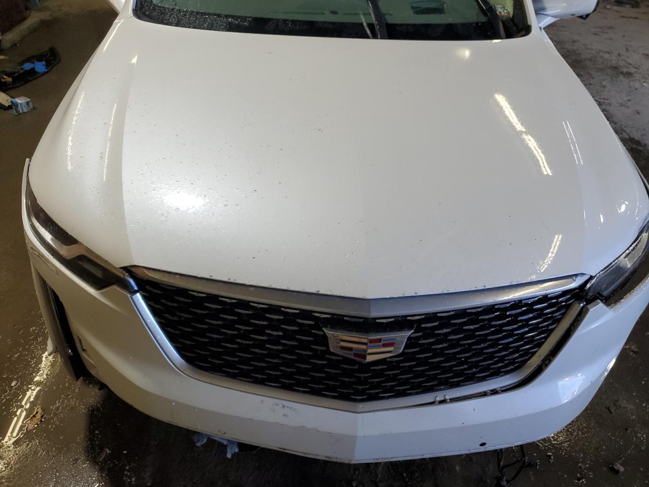 2022 Cadillac XT6 VIN 1GYKPDRS2NZ108715 Copart auction photo, side / front end damage thumbnail 12