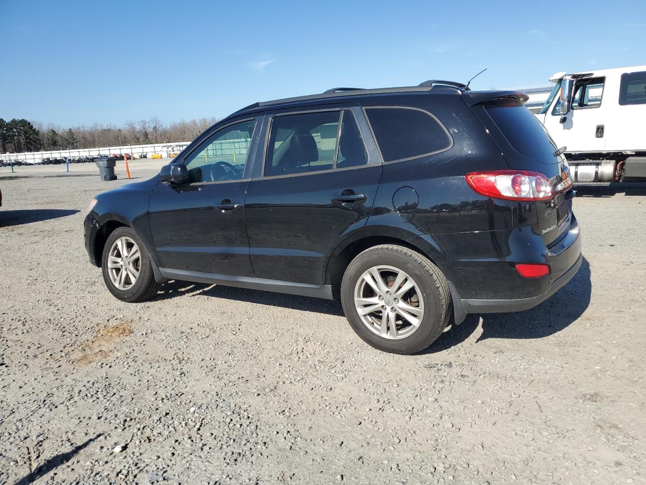 2012 Hyundai Santa Fe VIN 5XYZH4AG0CG142978 Copart auction photo, front end damage thumbnail 2