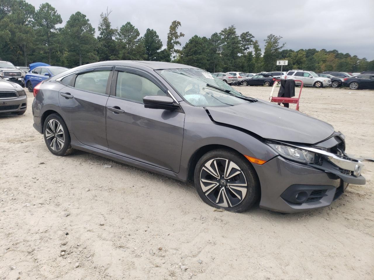 2018 Honda Civic VIN JHMFC1F77JX028977 Copart auction photo, all over damage thumbnail 4