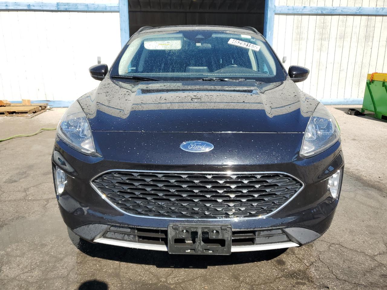 2021 Ford Escape VIN 1FMCU9H60MUA65942 Copart auction photo, undercarriage damage thumbnail 5