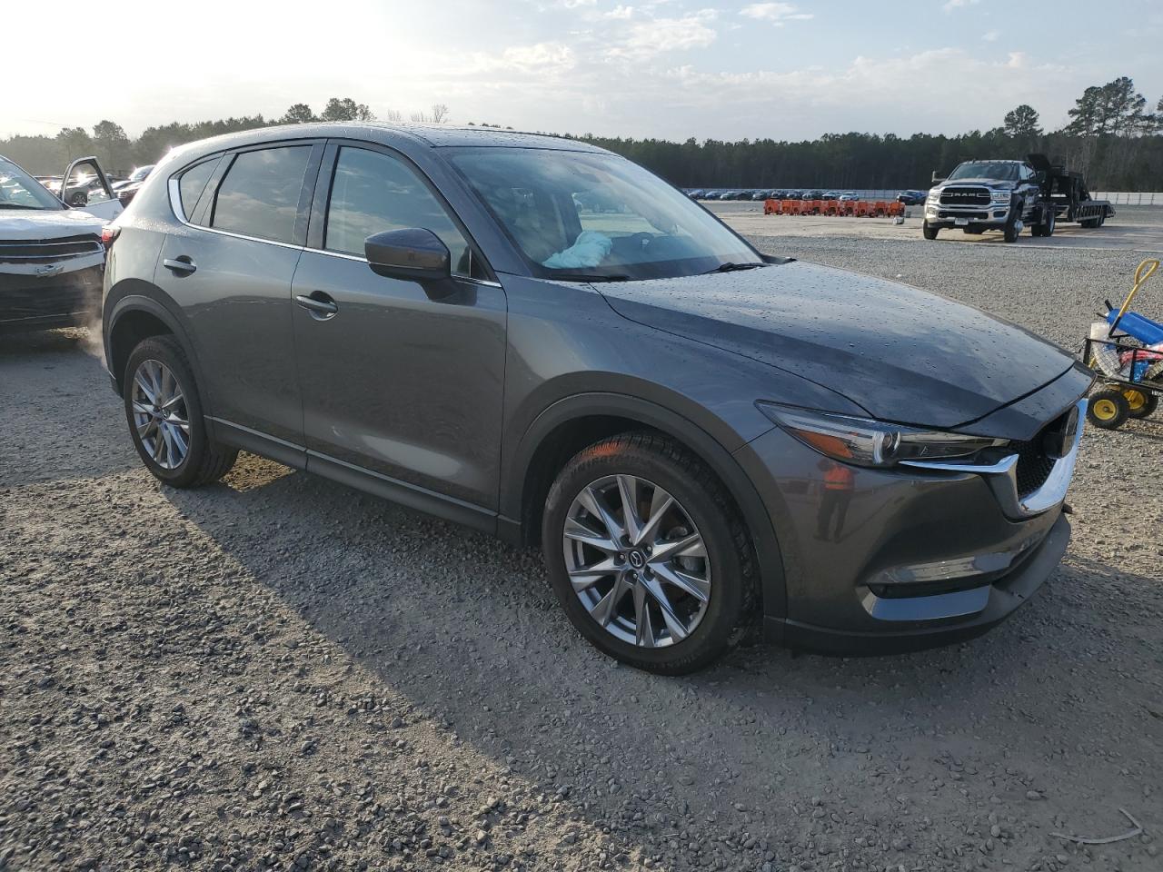2021 Mazda CX-5 VIN JM3KFBAY4M0489149 Copart auction photo, front end damage thumbnail 4
