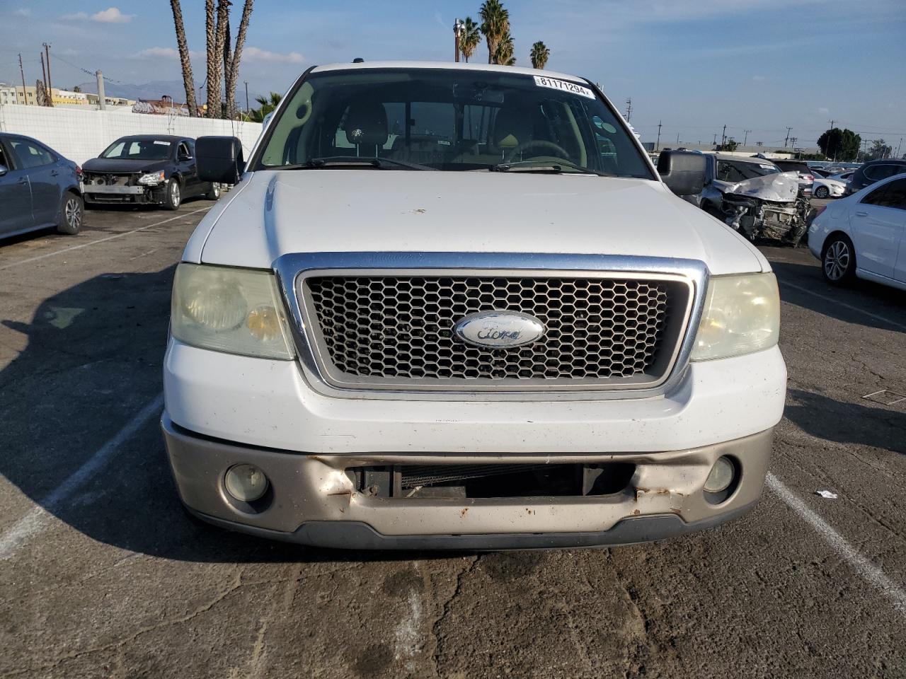 2006 Ford F-150 VIN 1FTPW12526KC02413 Copart auction photo, rear end / minor dent/scratches damage thumbnail 5