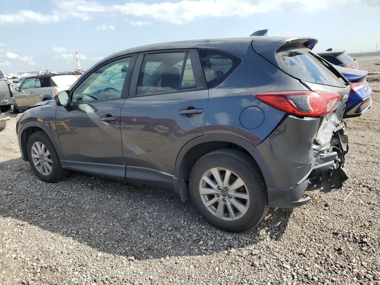 2015 Mazda CX-5 VIN JM3KE4CY4F0449216 Copart auction photo, rear end / minor dent/scratches damage thumbnail 2