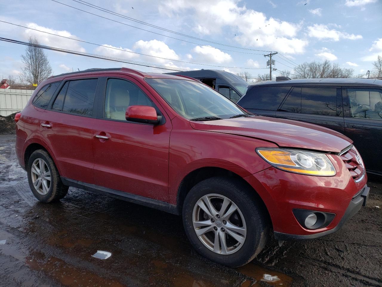 2011 Hyundai Santa Fe VIN 5XYZK3AB0BG067424 Copart auction photo, rear end / minor dent/scratches damage thumbnail 4