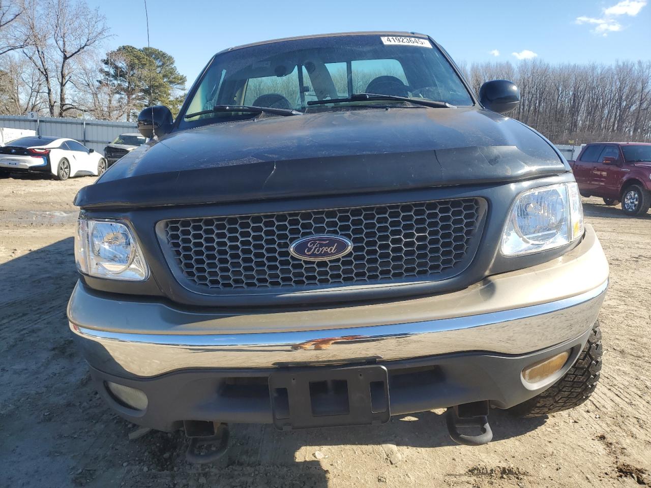 2000 Ford F-150 VIN 1FTRF18LXYNB73341 Copart auction photo, undercarriage damage thumbnail 5