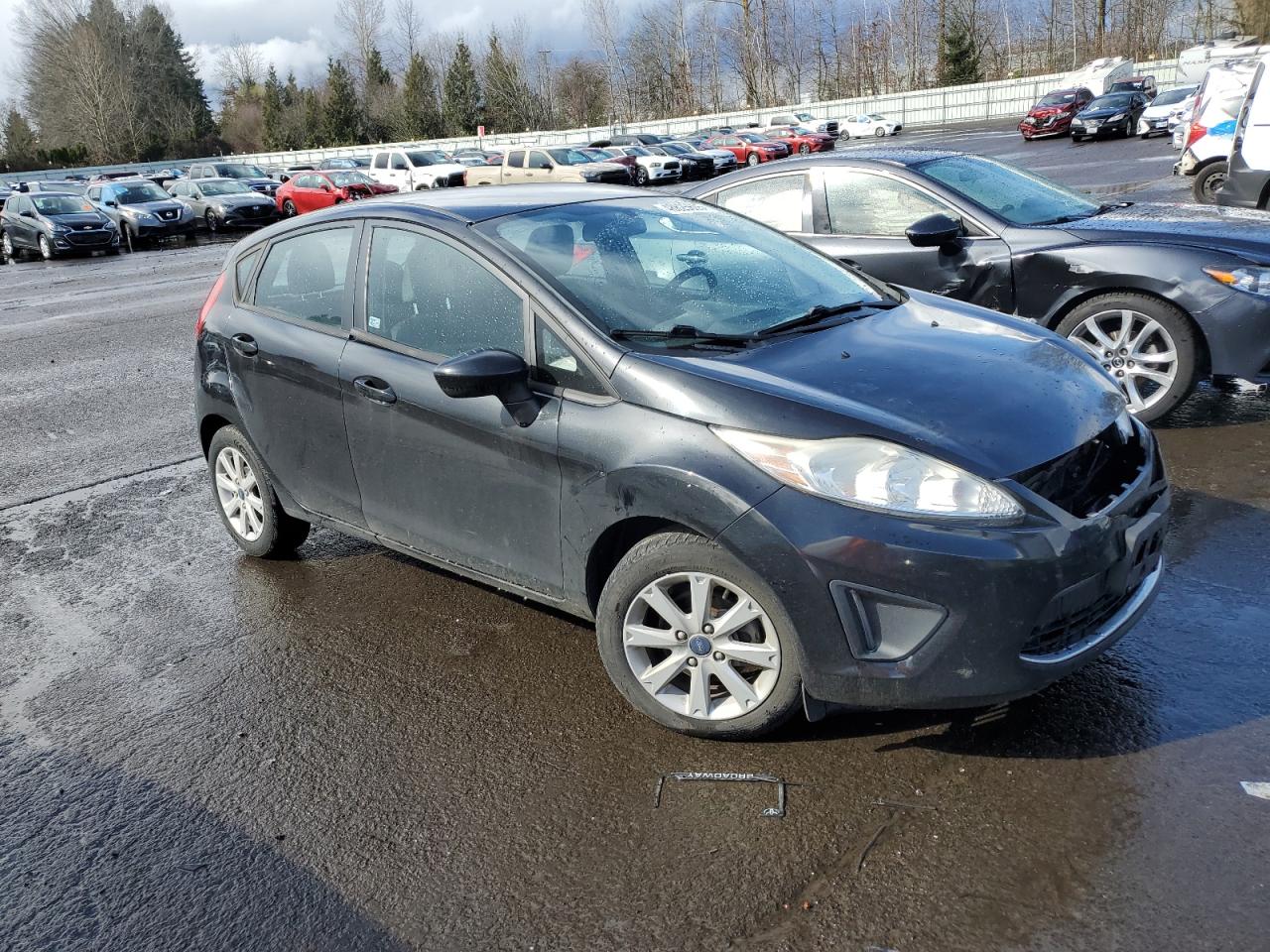 2012 Ford Fiesta VIN 3FADP4EJ4CM183237 Copart auction photo, front end damage thumbnail 4