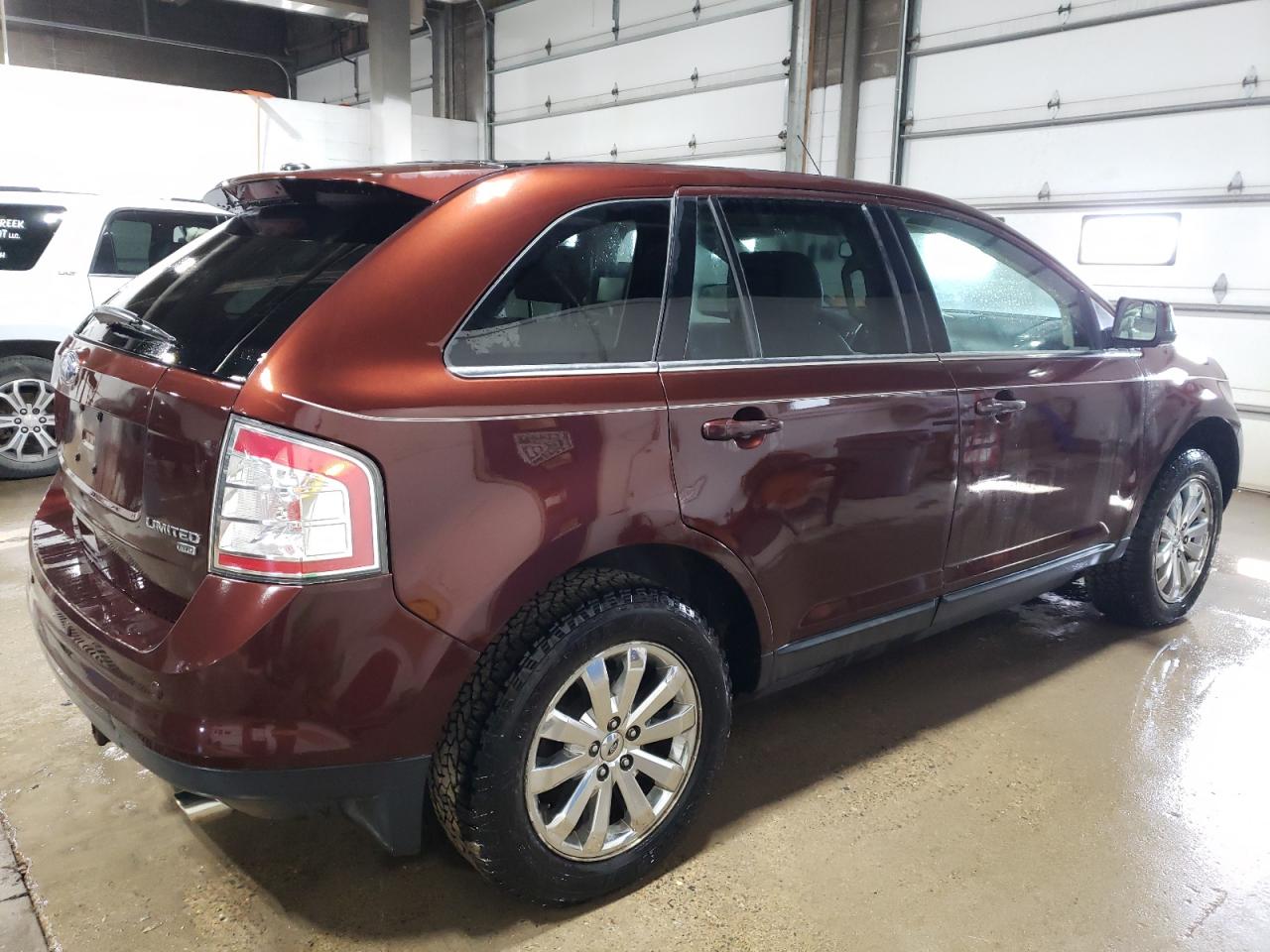 2009 Ford Edge VIN 2FMDK49C49BA85061 Copart auction photo, side / rear end damage thumbnail 3