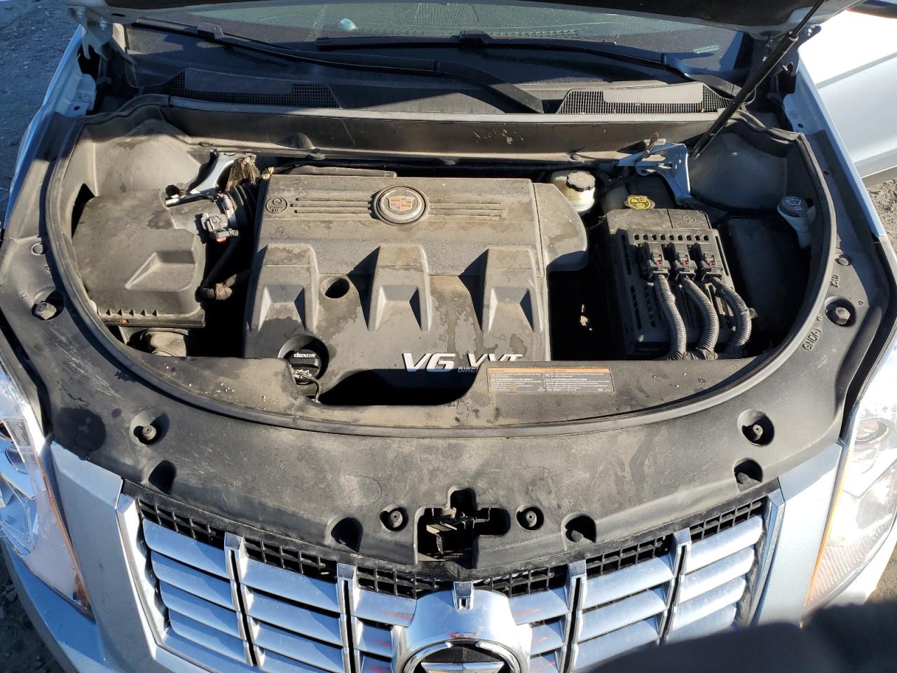 2013 Cadillac SRX VIN 3GYFNGE33DS567674 Copart auction photo, front end / side damage thumbnail 12
