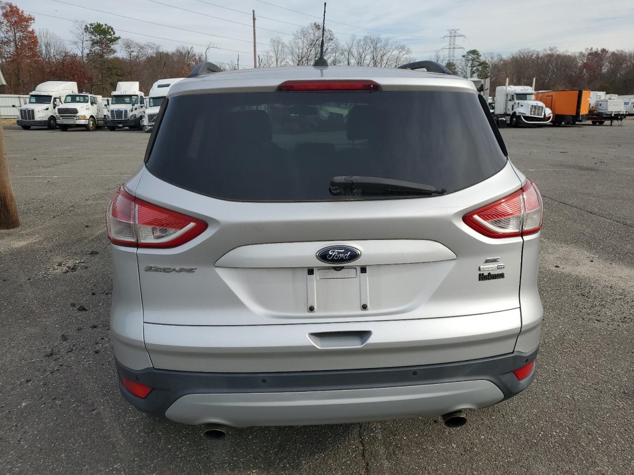 2015 Ford Escape VIN 1FMCU9G91FUB44812 Copart auction photo, normal wear damage thumbnail 6