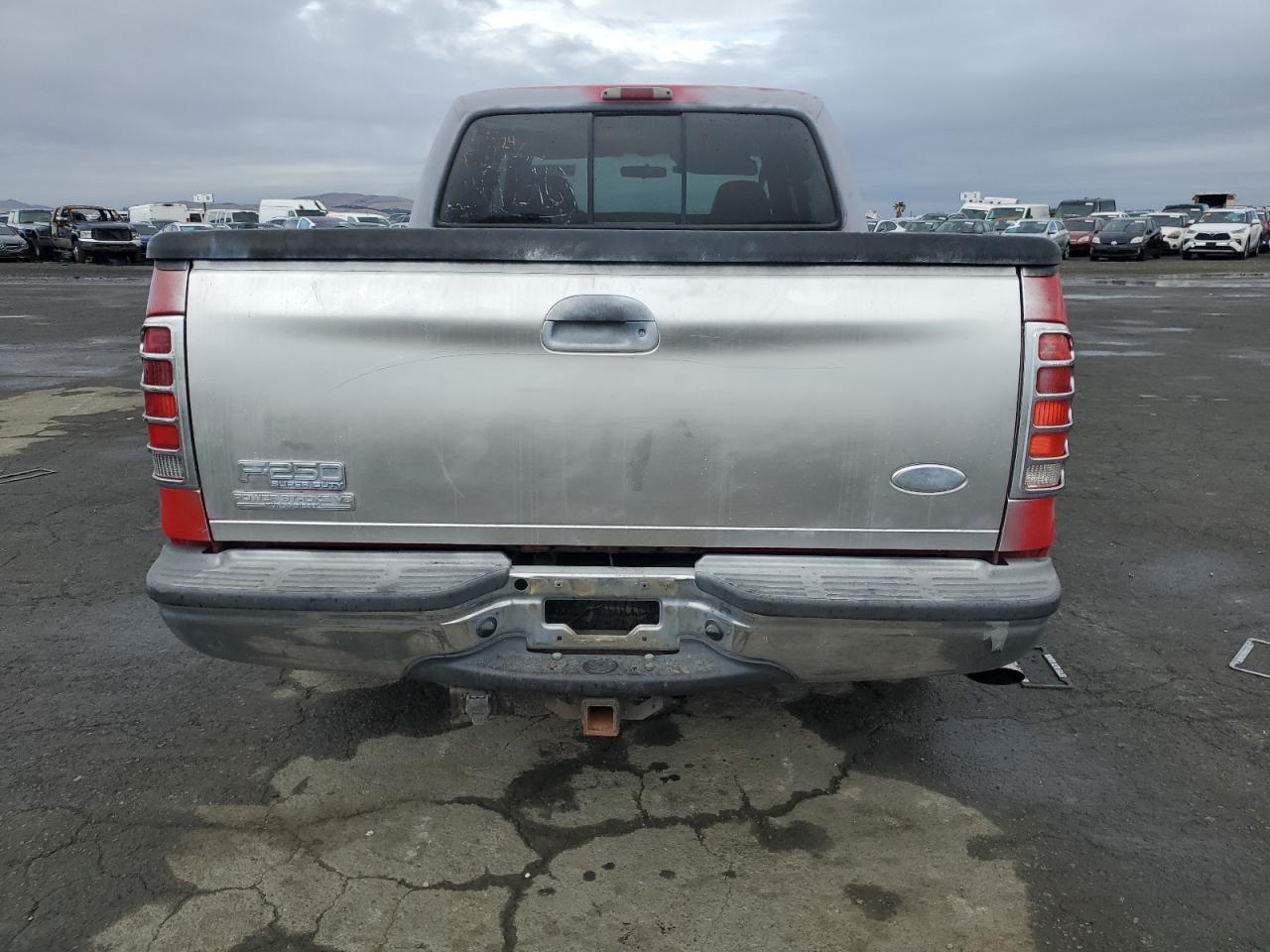 2003 Ford F250 VIN 1FTNW20P03EC34109 Copart auction photo, vandalism damage thumbnail 6