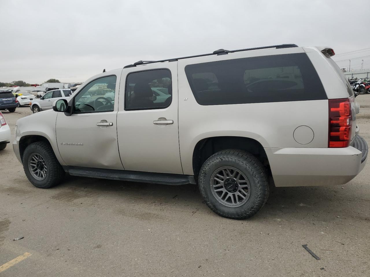 2009 Chevrolet Suburban VIN 1GNFK26349R255803 Copart auction photo, front end / side damage thumbnail 2