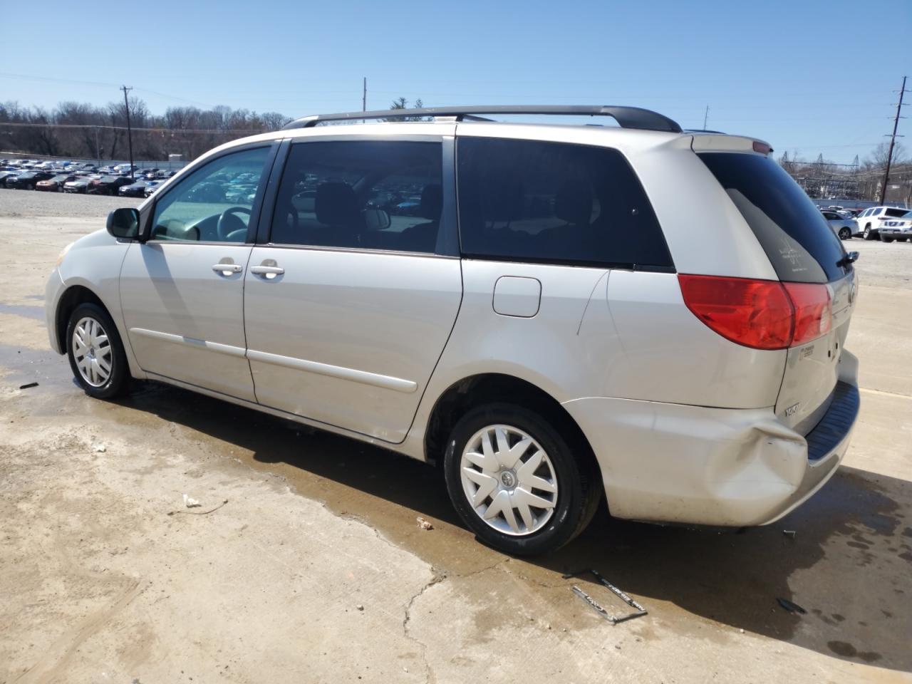 2010 Toyota Sienna VIN 5TDKK4CC8AS342858 Copart auction photo, side / rear end damage thumbnail 2