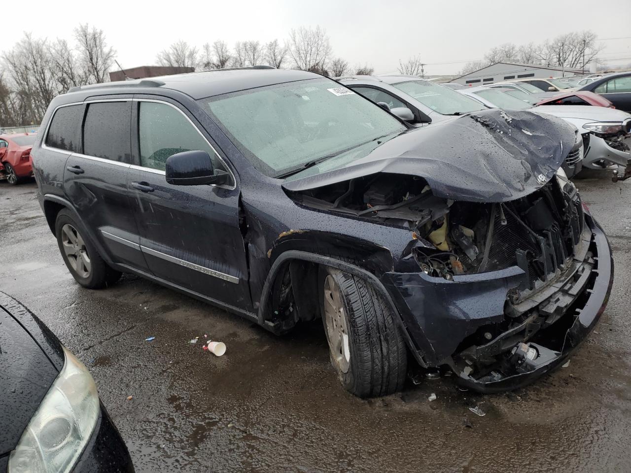 2011 Jeep Grand Cherokee VIN 1J4RR4GG7BC527651 Copart auction photo, front end damage thumbnail 4