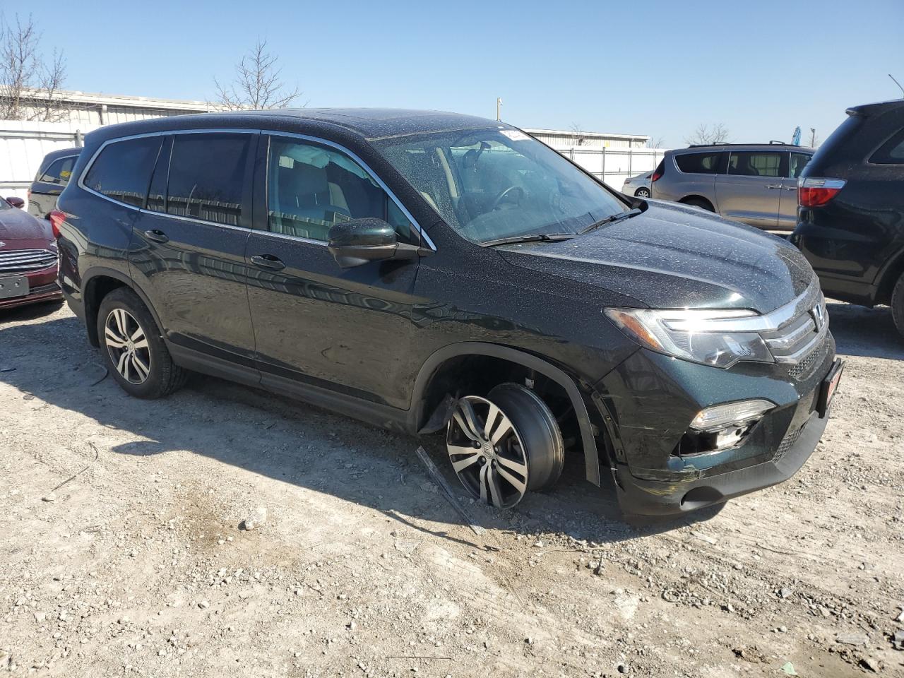 2018 Honda Pilot VIN 5FNYF6H57JB012654 Copart auction photo, front end / minor dent/scratches damage thumbnail 4