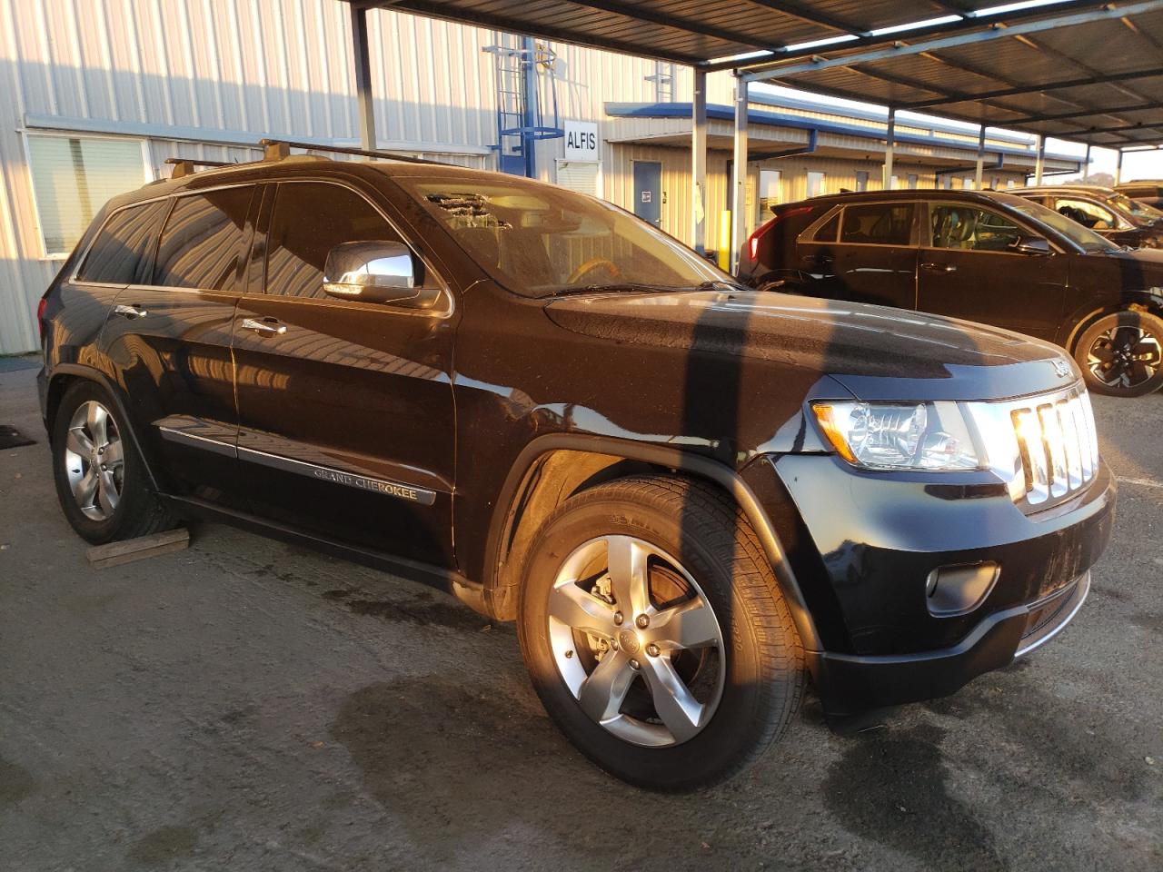 2013 Jeep Grand Cherokee VIN 1C4RJFCG1DC522754 Copart auction photo, all over damage thumbnail 4