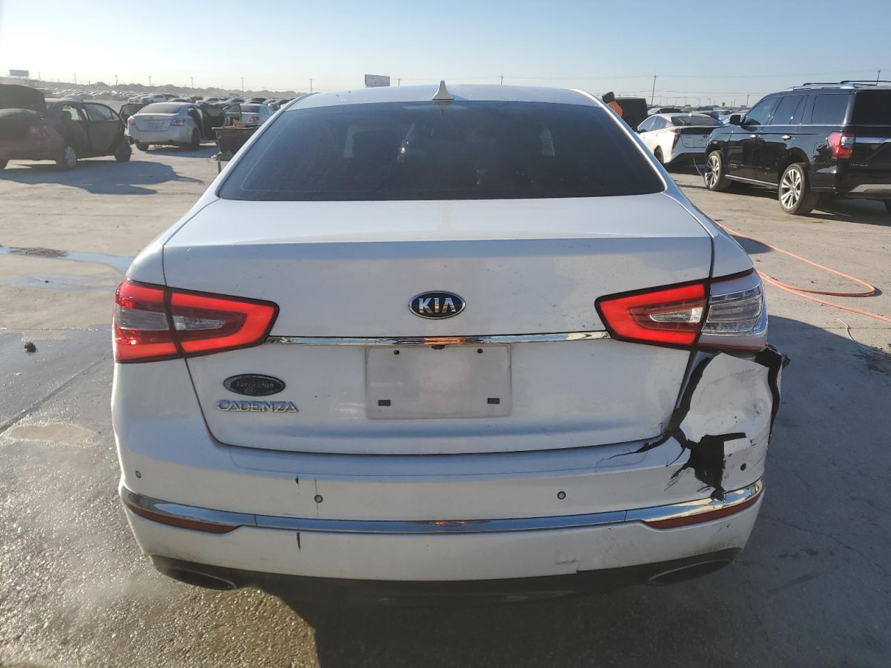 2014 KIA Cadenza VIN KNALN4D70E5133474 Copart auction photo, rear end / minor dent/scratches damage thumbnail 6