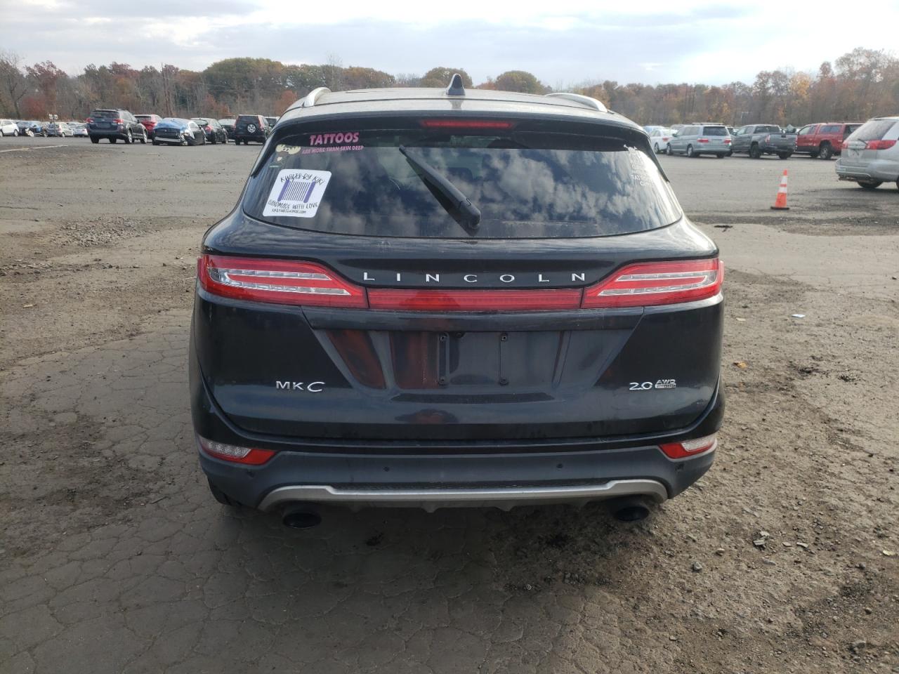 2015 Lincoln MKZ VIN 5LMCJ2A9XFUJ09725 Copart auction photo, side damage thumbnail 6