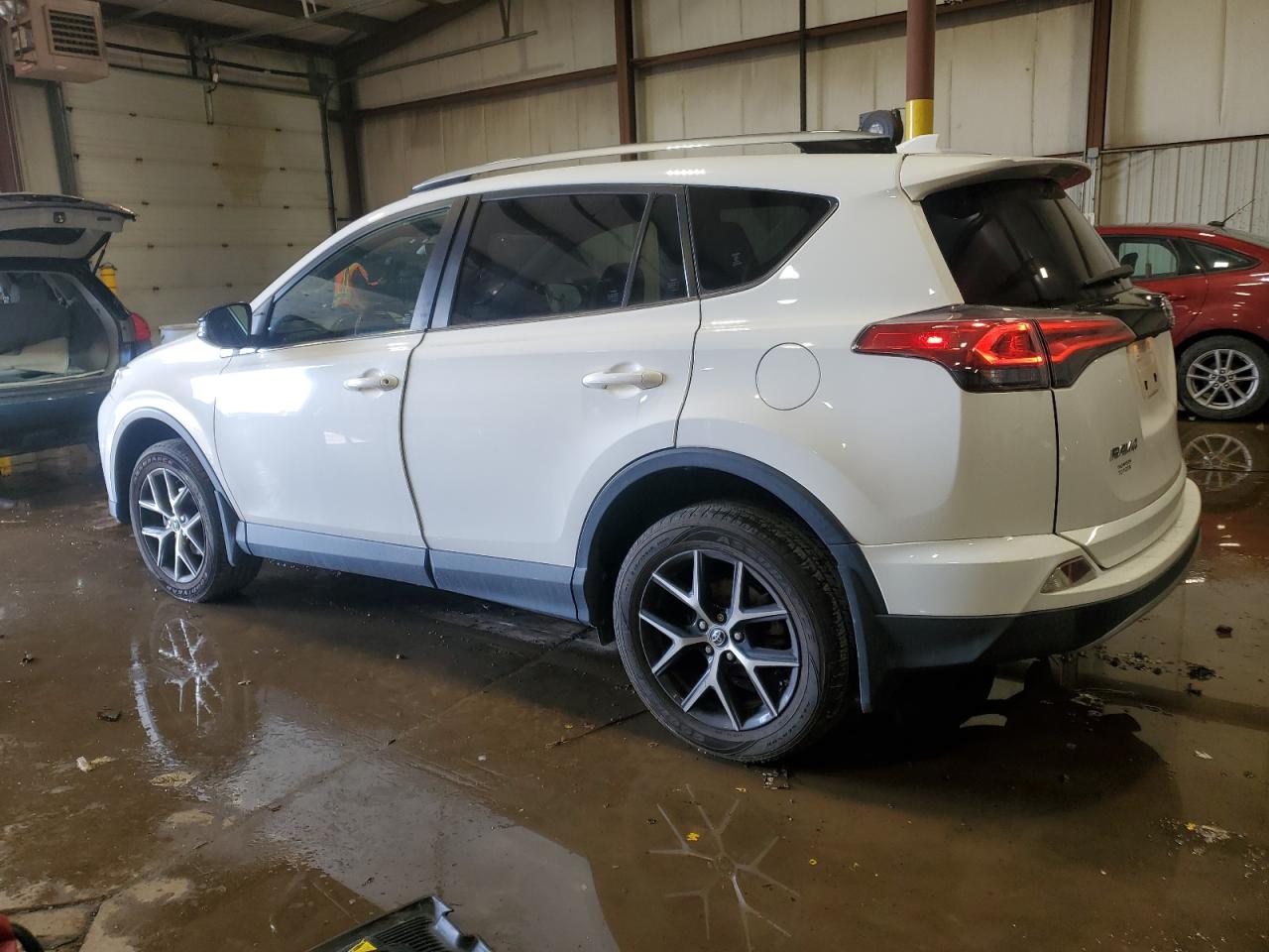 2018 Toyota RAV 4 VIN JTMJFREV8JD242461 Copart auction photo, side / rear end damage thumbnail 2