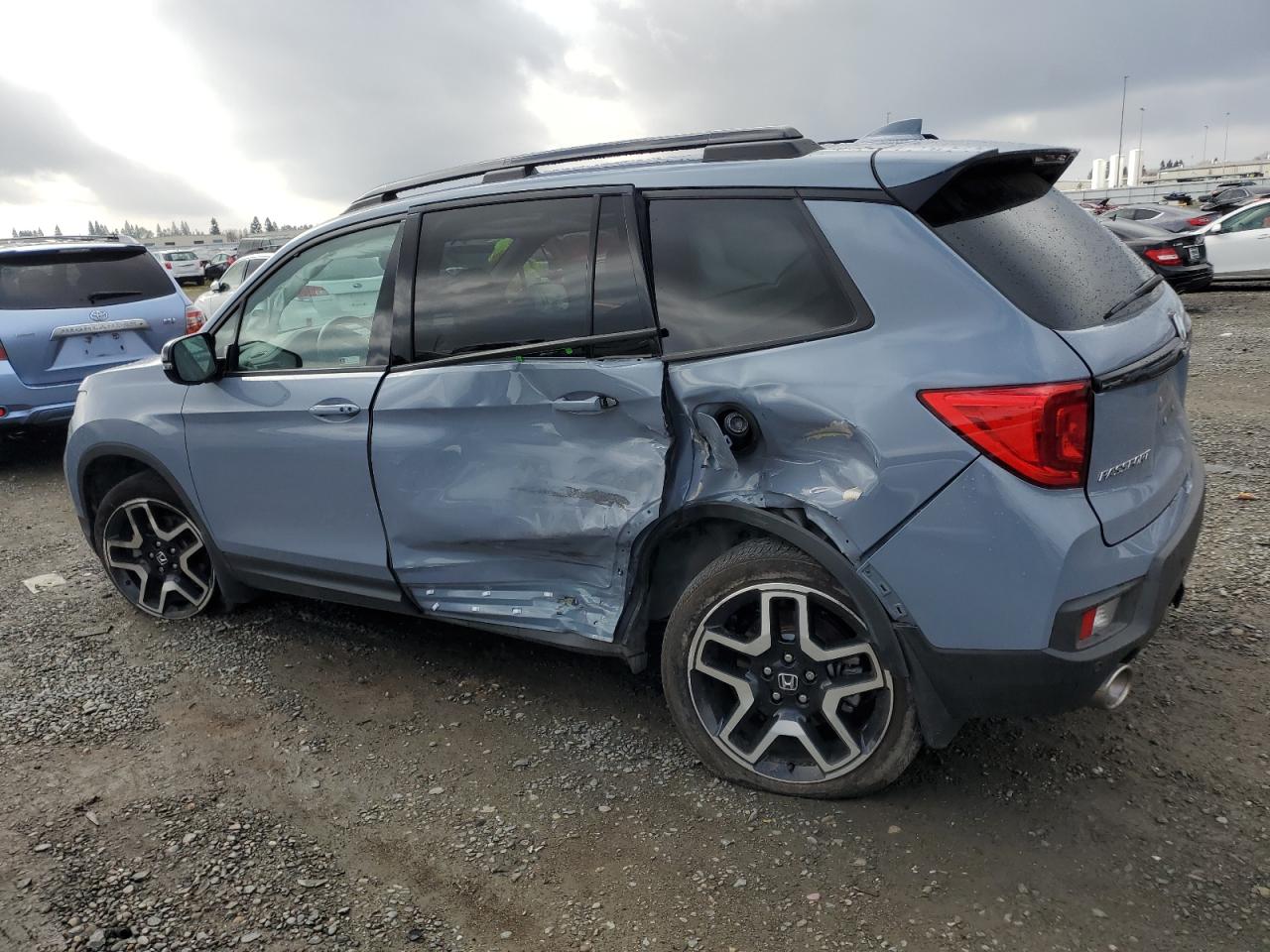 2022 Honda Passport VIN 5FNYF8H09NB014539 Copart auction photo, all over damage thumbnail 2