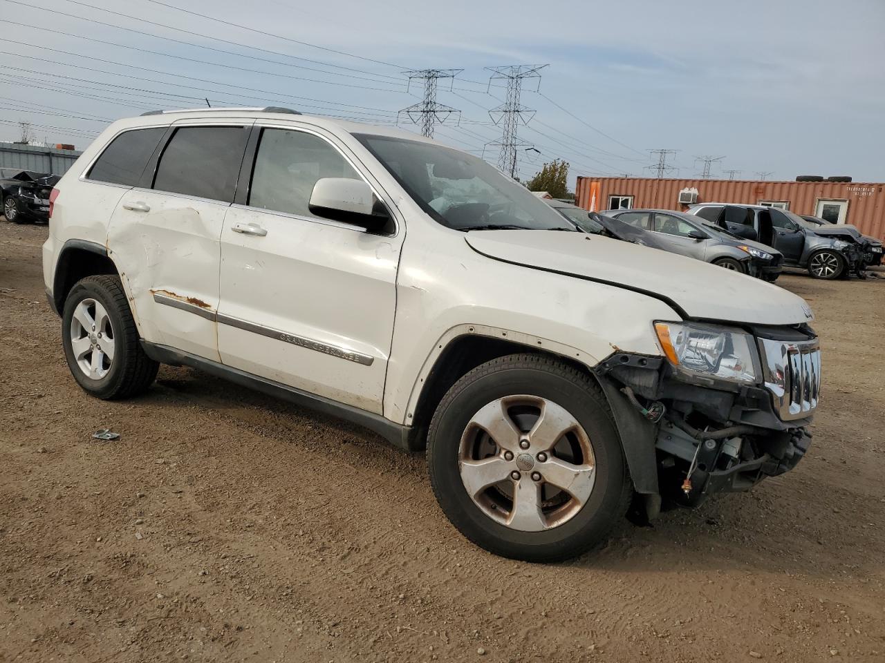 2011 Jeep Grand Cherokee VIN 1J4RR4GG2BC670975 Copart auction photo, front end damage thumbnail 4