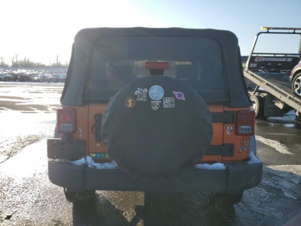 JEEP WRANGLER ORANGE - 1J4AA2D11AL224193