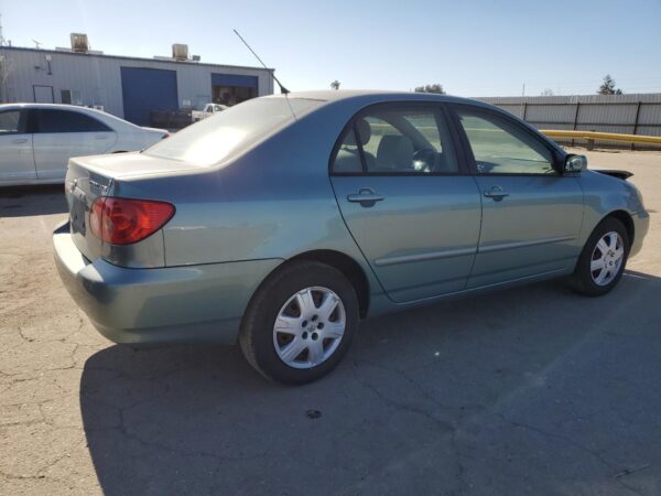 TOYOTA COROLLA TURQUOISE - 1NXBR30E85Z391387