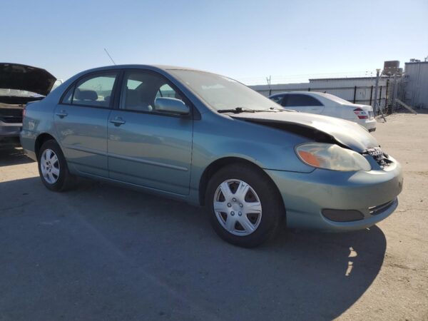 TOYOTA COROLLA TURQUOISE - 1NXBR30E85Z391387
