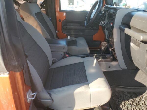 JEEP WRANGLER ORANGE - 1J4AA2D11AL224193