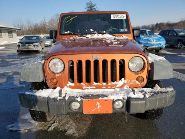 JEEP WRANGLER ORANGE - 1J4AA2D11AL224193