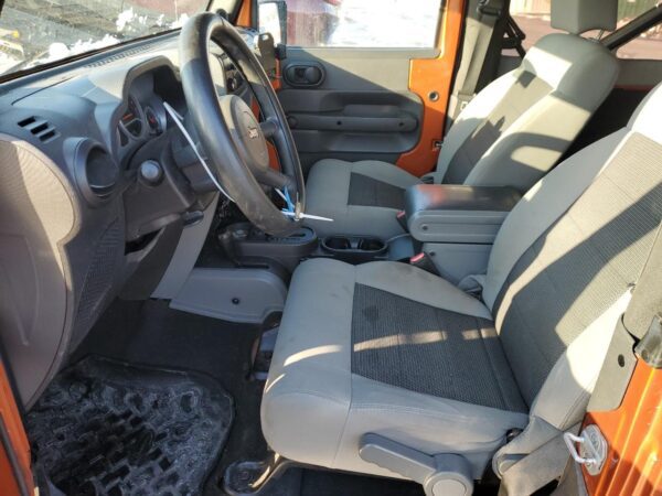 JEEP WRANGLER ORANGE - 1J4AA2D11AL224193