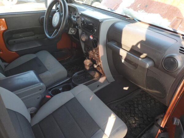 JEEP WRANGLER ORANGE - 1J4AA2D11AL224193